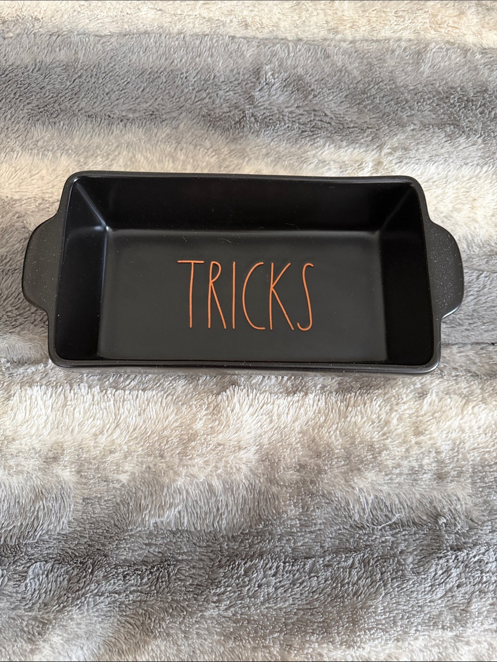 Rae Dunn Black Ceramic 'TRICKS' Baking Dish with Orange Lettering